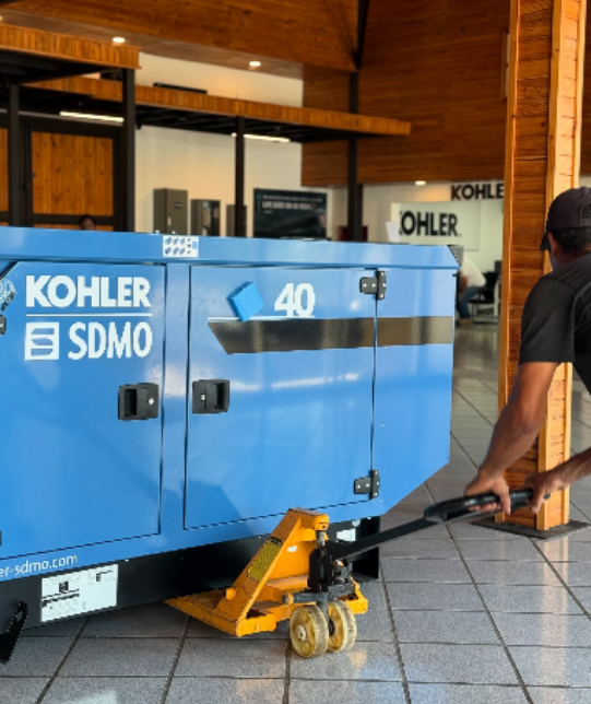 Kohler SDMO generator being moved indoors
