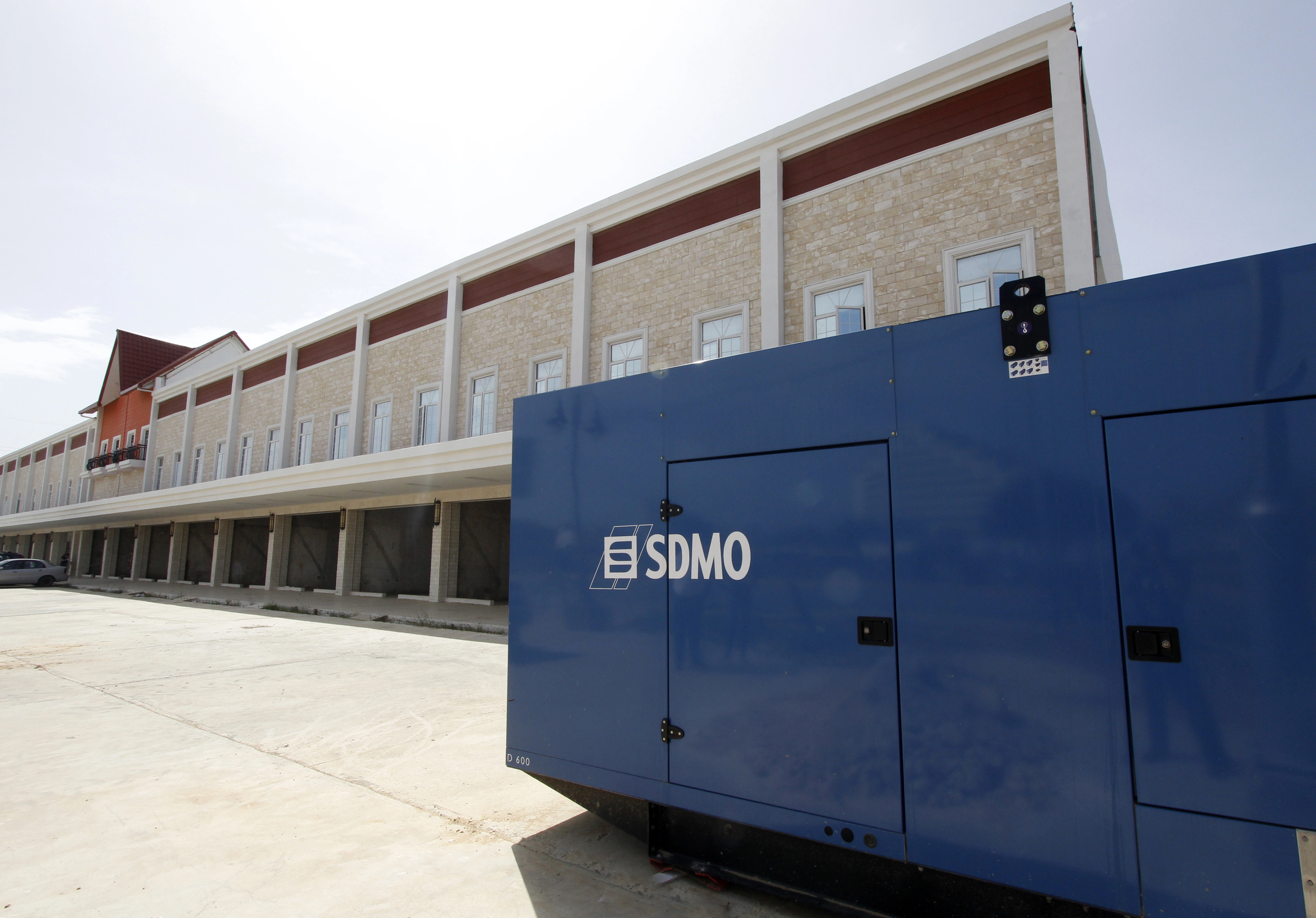 Kohler SDMO generator being moved indoors