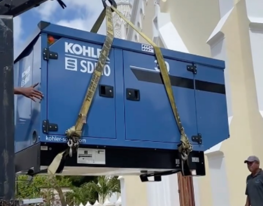 Kohler SDMO generator being lifted